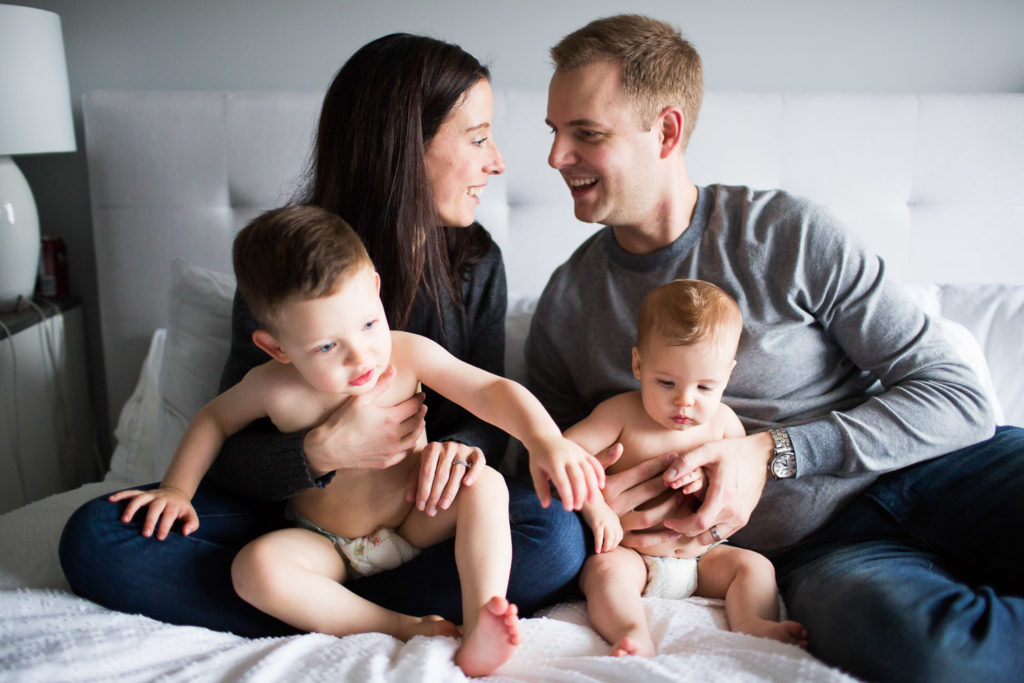 Family at home in bed for photography session